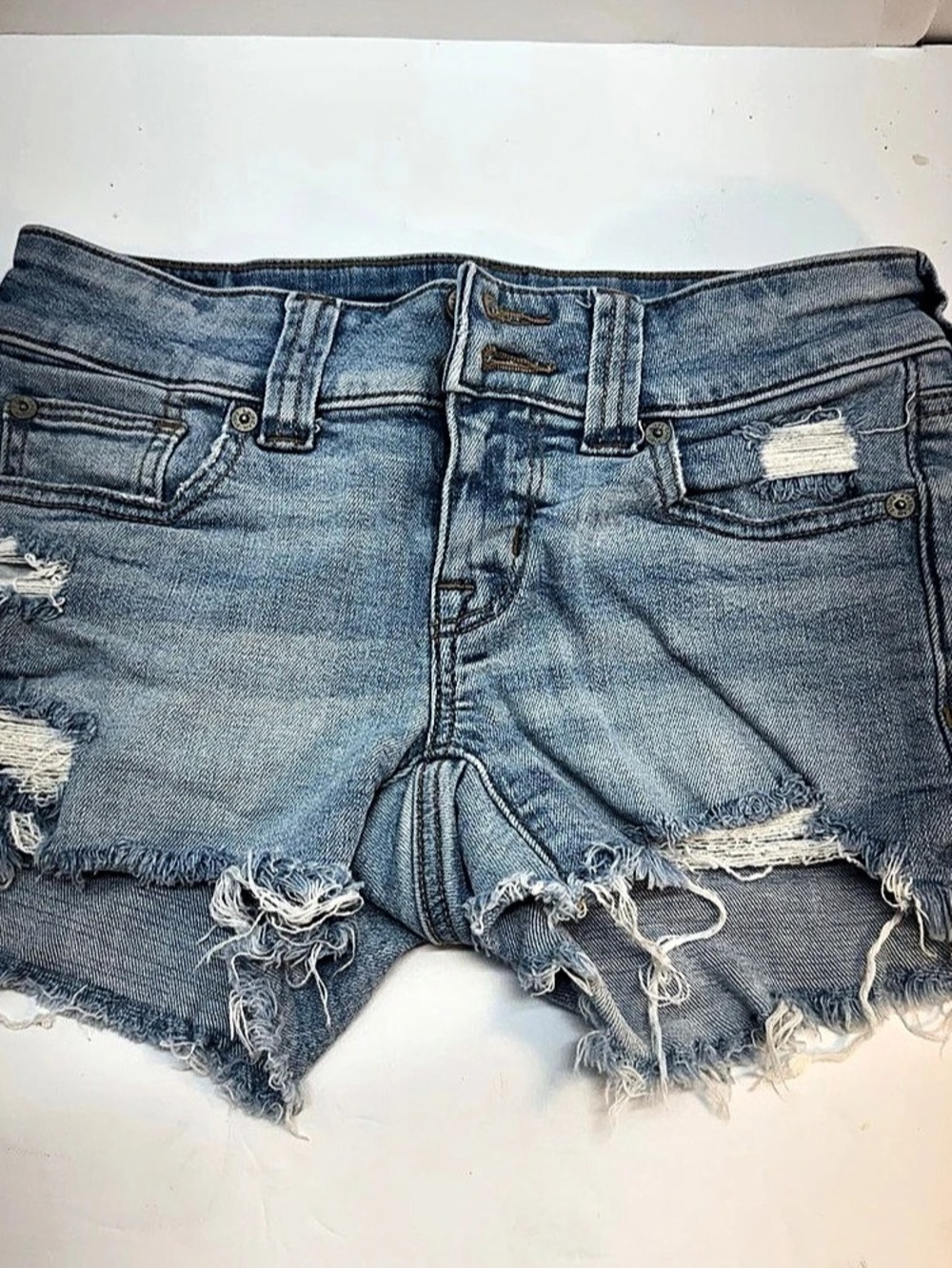 American Eagle Distressed Jean Shorts in Blue Size 0